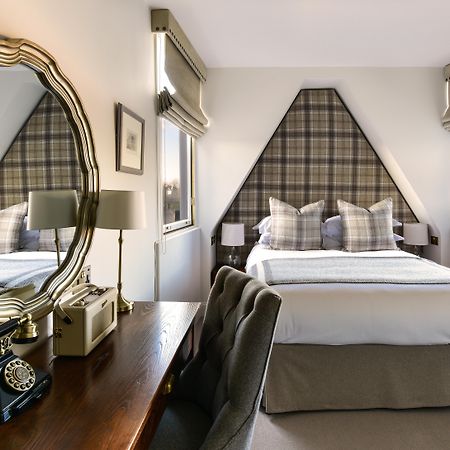 The Roseate Edinburgh - Small Luxury Hotels Of The World Edimburgo Exterior foto A bedroom at the hotel
