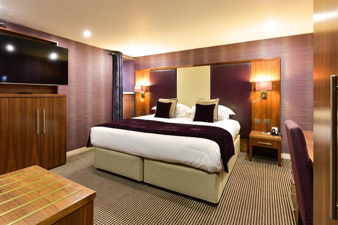 The Roseate Edinburgh - Small Luxury Hotels Of The World Edimburgo Exterior foto A Premier Inn bedroom