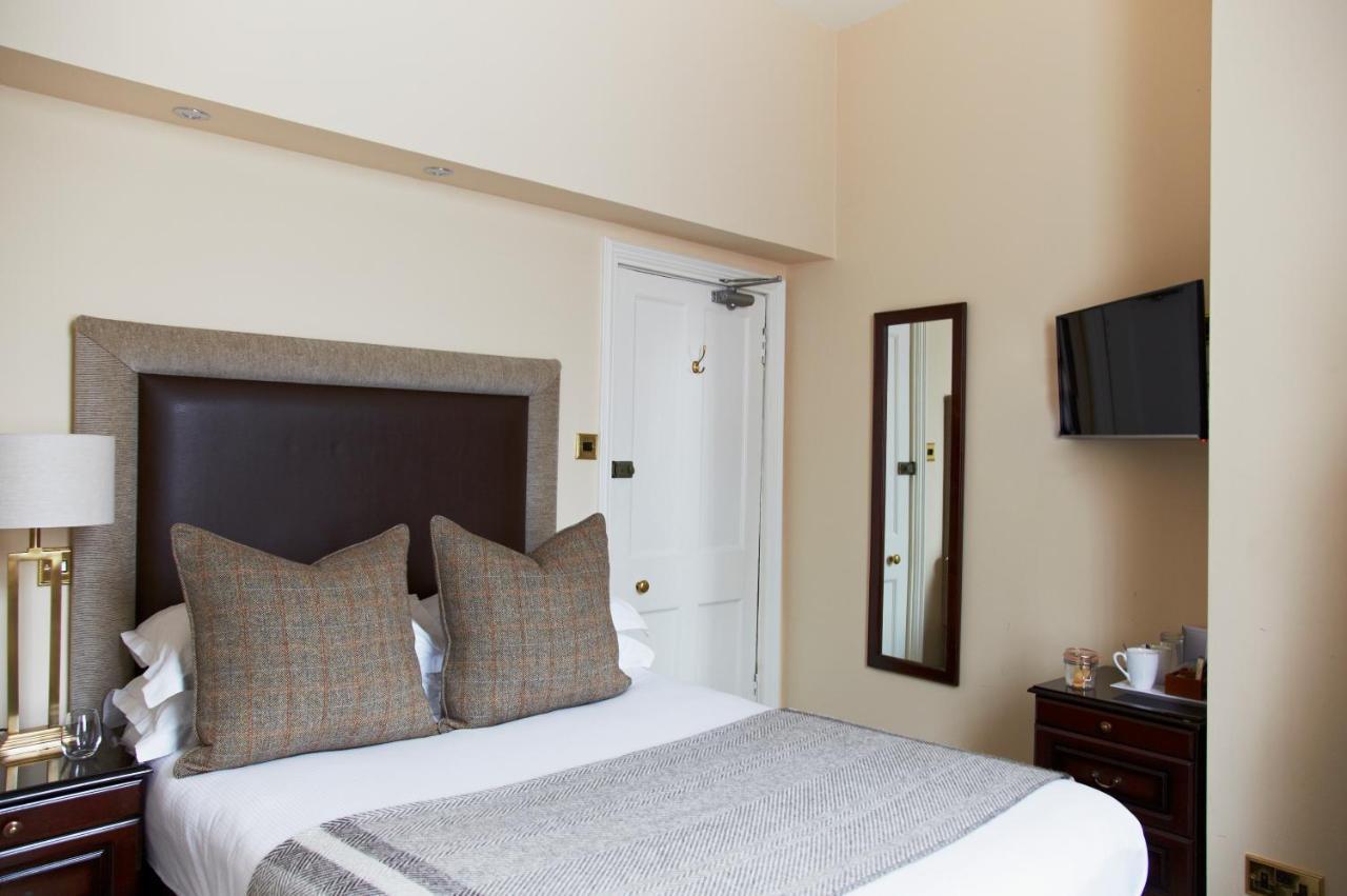 The Roseate Edinburgh - Small Luxury Hotels Of The World Edimburgo Exterior foto A bedroom at the hotel